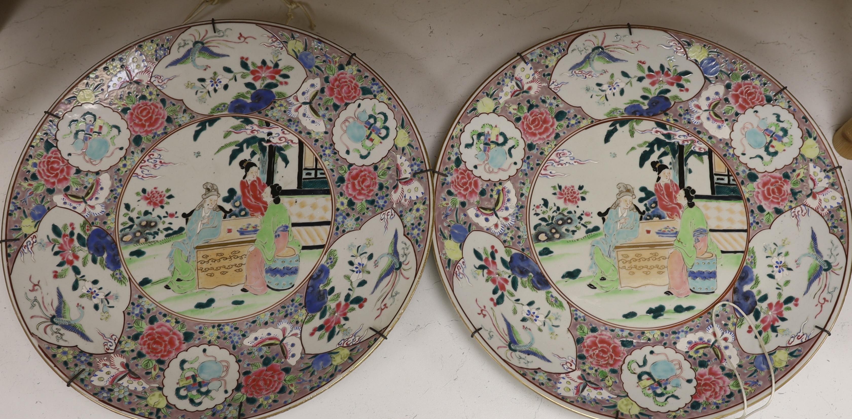 A pair of early 20th century Japanese porcelain chargers, 46cm diameter